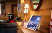 Fire place and sofas in chalet Snow Pearl